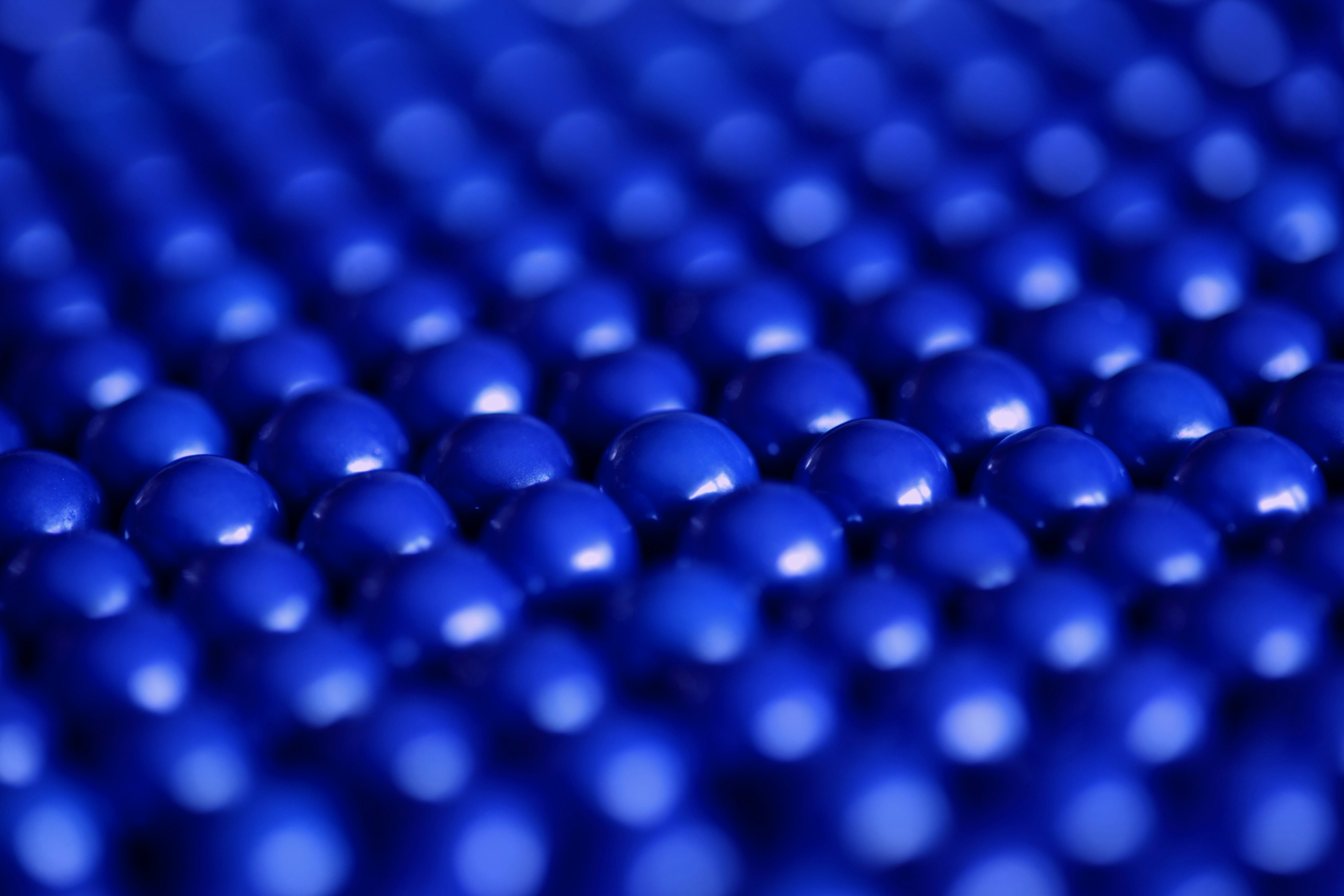 close up photography of blue balls digital wallpaper